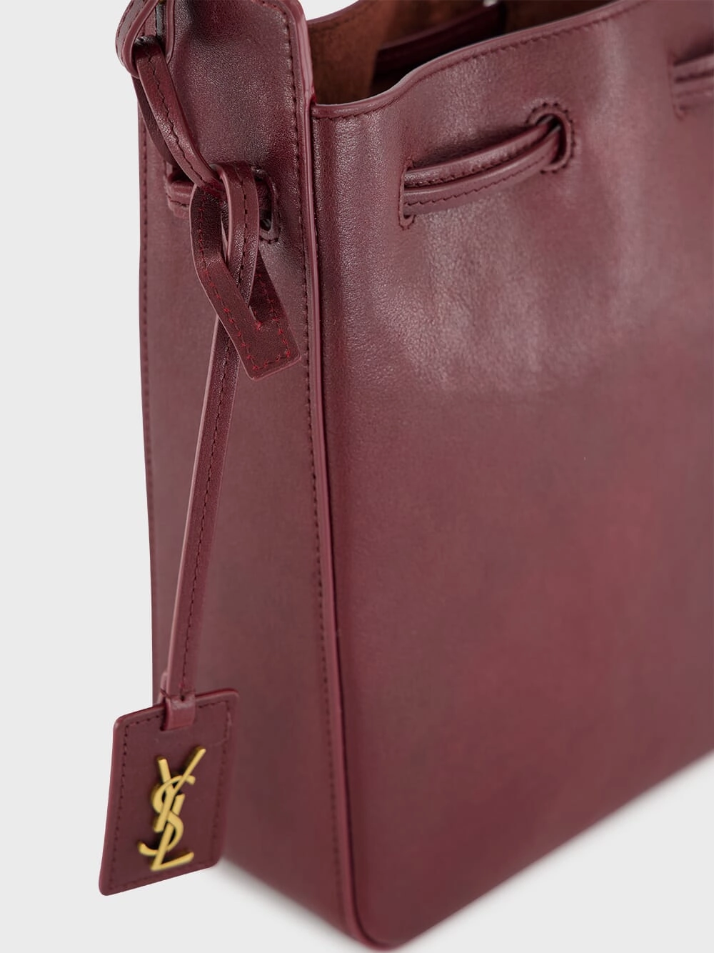 Hot Wine Leather Bucket Bag with Cassandre Charm