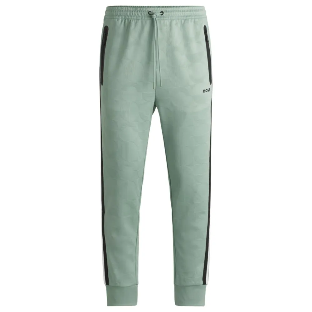 Relaxed-fit tracksuit bottoms with jacquard-woven circles