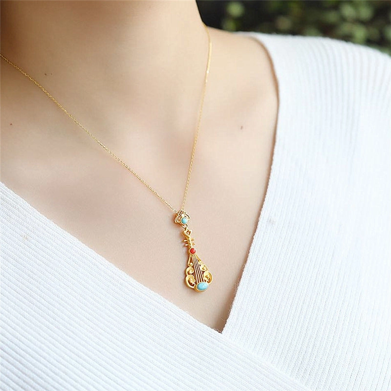 Wholesale Sand gold inlaid turquoise and red Nanhong personality pipa clavicle necklace